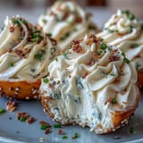 Deviled eggs topped with Everything Bagel seasoning, perfect for any gathering.