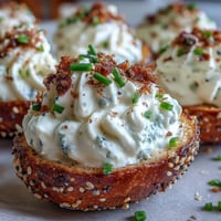 Everything Bagel Deviled Eggs brimming with creamy filling and poppy.